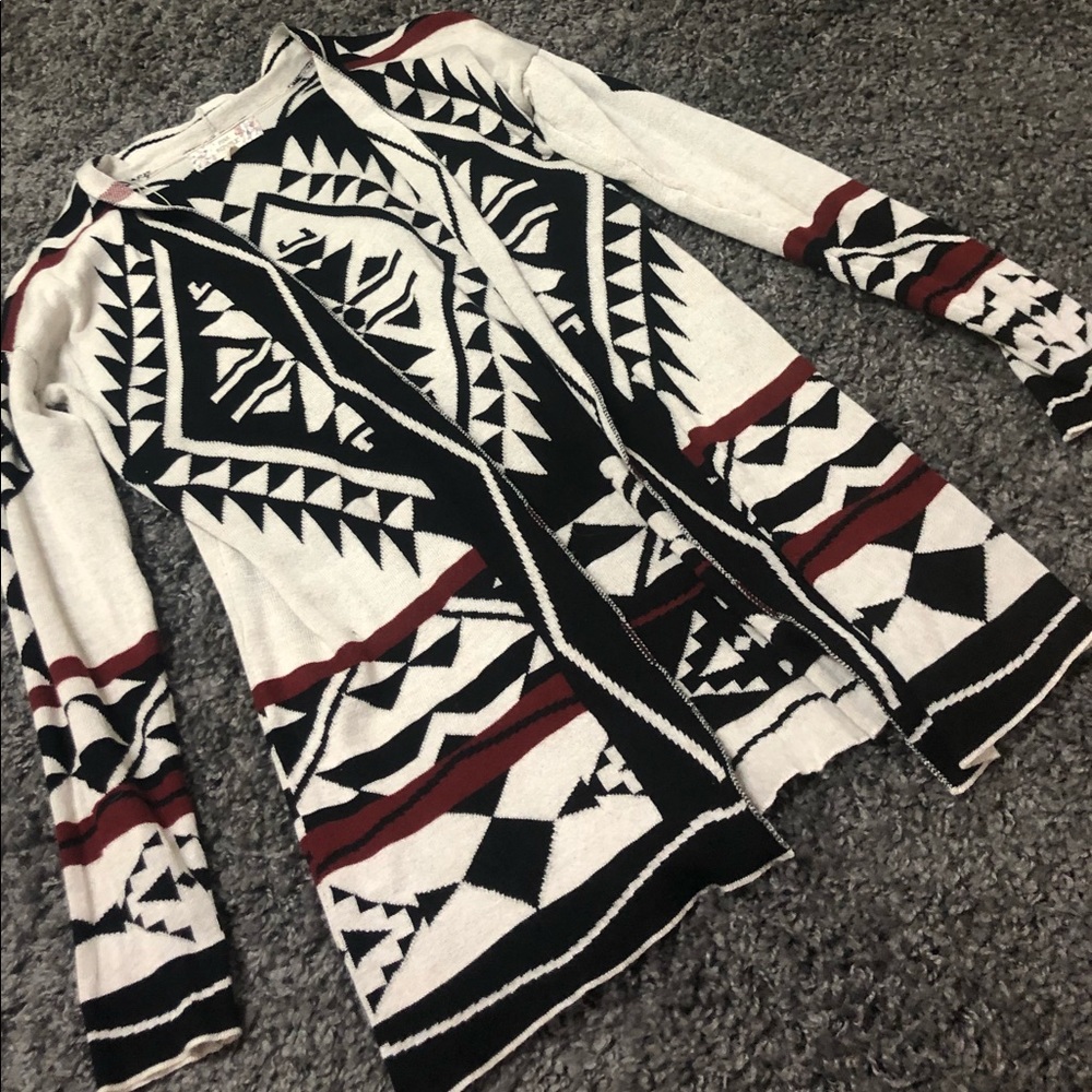 Red, Black, and Cream colored Cardigan